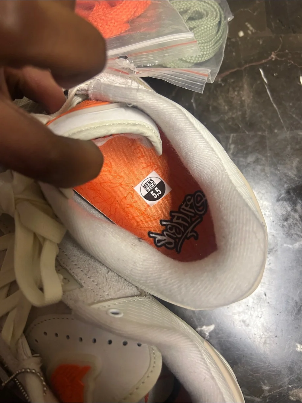 Jordan Low-Top Sneakers in Light Gray with Orange Accents